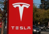 PALO ALTO, CA - NOVEMBER 05: A sign is posted at a Tesla showroom on November 5, 2013 in Palo Alto, California. Tesla will report third quarter earnings today after the closing bell. (Photo by Justin Sullivan/Getty Images)