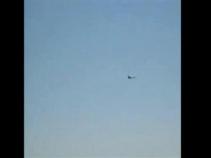 Caught on Video: Military Plane Buzzes Pier