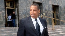 Rap mogul Jay Z departs United States District Court after testifying in a copyright lawsuit on October 14, 2015, in Los Angeles.