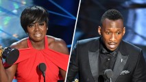 Viola Davis, left, and Mahershala Ali receive their Oscar awards for Best Support Actress and Best Supporting Actor respectively, on Feb. 26, 2017, in Hollywood, California.