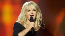 In this file photo, singer Bonnie Tyler performs during the grand final of the 2013 Eurovision Song Contest at Malmo Arena on May 18, 2013 in Malmo, Sweden. Tyler will sing her iconic hit, "Total Eclipse of the Heart," during the total solar eclipse Monday, Aug. 21