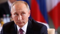 Russian President Vladimir Putin attends a meeting to discuss the Ukrainian peace process at the German federal Chancellery in this October 19, 2016 file photo from Berlin, Germany.