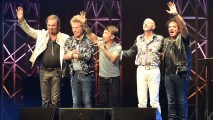 FILE - (Left to right) Musicians Jonathan Cain, Ross Valor, Arnel Pineda, Steve Smith and Neal Schon of Journey perform live, Feb. 7, 2017, in Tokyo, Japan.