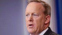 FILE - Then-White House press secretary Sean Spicer speaks to members of the media in the Brady Briefing room of the White House in Washington, July 17, 2017.