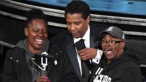 A pair of tourists from Chicago is brought into the Oscars for a surprise meet with nominee for Best Actor in "Fences" Denzel Washington at the 89th Oscars on Feb. 26, 2017 in Hollywood, California.