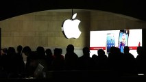In this file photo, people walk through the Apple retail store in Grand Central Terminal on December 10, 2012 in New York City.