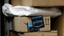 In this Tuesday, May 9, 2017 file photo, a package from Amazon Prime is loaded for delivery on a UPS truck, in New York. Amazon is extending its annual 