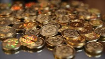 A pile of mock Bitcoins