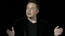 In this file photo, Tesla CEO Elon Musk speaks during an event to launch the new Tesla Model X Crossover SUV on September 29, 2015 in Fremont, California.