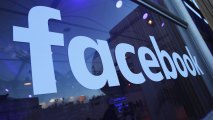 FILE - The Facebook logo is displayed at the Facebook Innovation Hub, Feb. 24, 2016, in Berlin, Germany.