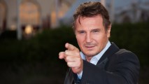 In this Sept. 7, 2012 file photo, Liam Neeson poses on the red carpet before a screening of his movie "Taken 2." Neeson showed up at a sandwich shop that wrote "Liam Neeson eats here for free" on a sign outside of its store in British Columbia Wednesday.