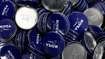 File photo Nivea cream cans are pictured in a Beiersdorf factory in Hamburg, Germany.