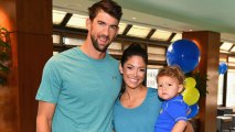 Michael Phelps, Nicole Phelps and Boomer Phelps the Huggies Little Swimmers #trainingfor2032 Swim Class With The Phelps Foundation on August 21, 2017 in New York City. The couple announced a new addition is coming to the family.