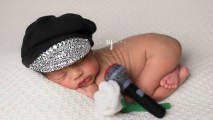 Fifteen-day-old Natalia Gallegos channels Tejano pop star Selena in her newborn photo shoot.