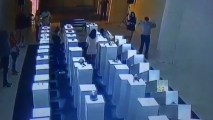 Woman Taking Selfie Damages $200,000 in Art