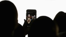 In this file photo, models pose for a Snapchat photo using animal face filters on their mobile phone as they wait for pre-show instructions during rehearsal at The Innovators: Fashion Design Studio show during Mercedes-Benz Fashion Week Resort 17 Collections on May 20, 2016 in Sydney, Australia.