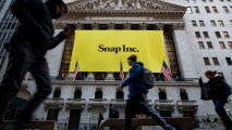 In this file photo, Signage for Snap Inc., parent company of Snapchat, adorns the front of the New York Stock Exchange, March 2, 2017 in New York City.