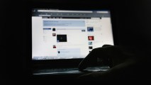 In this March 25, 2009, file photo, the social networking site Facebook is displayed on a laptop screen in London.