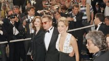 Jeanne Tripplehorn, Michael Douglas and Sharon Stone arrive at the premiere of the 45th annual Cannes Film Festival, May 7, 1992. A screening of their movie "Basic Instinct" kicked off the famed festival .