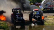 Tractors Race Through Mud, Puddles and Fire in Russia