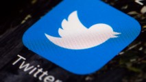 This April 26, 2017, photo shows the Twitter icon on a mobile phone, in Philadelphia.
