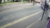 Image captured by CCTV of a bus moments before it strikes a U.K. man.