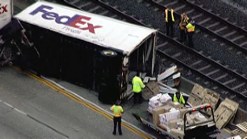 Rain, FedEx Truck Crash Slow Morning Drive