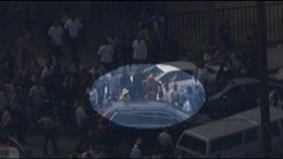 Raw Video: Bystander Leaps Into Getaway Car