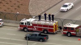 Firefighters, Other Mourners Line MacKay Procession Route
