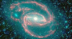 Galaxy Has Gas, Dust, Star Eating Monster at Center