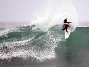 Surfers Fill Tip Jar for Quake Victims