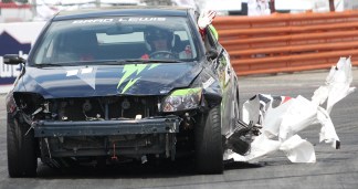 Stars and Their Wrecked Cars at Long Beach GP
