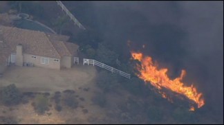 Raw Video: Firefighters Protect Homes