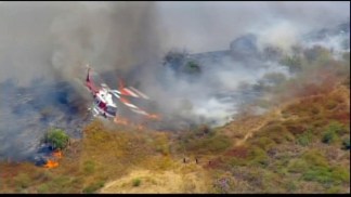 Raw Video: Brush Fire Spreads in Carbon Canyon