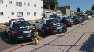 Search for Gunmen Who Shot Cop