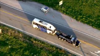 Tour Bus Involved in Deadly Crash Towed From Scene