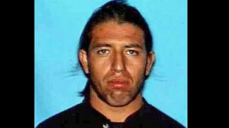 Ex-Wrestling Coach Didn't Face Accusations on Campus