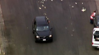 Raw Video: Cash Tossed During SUV Pursuit