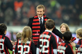Beckham Changes Stripes, Posh Stays With Basic Black