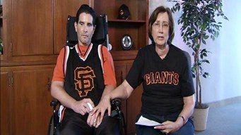 Beating Victim's Son Throws First Pitch