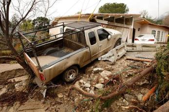 Race Is on to Clear Debris Basins Before More Rain