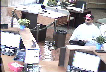 Caught on Camera: Knife-Wielding Bank Robber