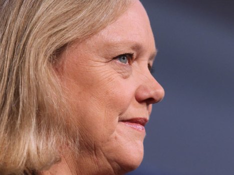Whitman Defends Attack Ads