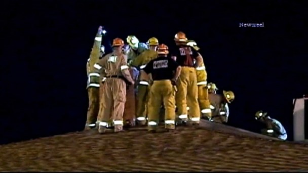 Firefighters Rescue Soot-Covered Man Stuck in Chimney