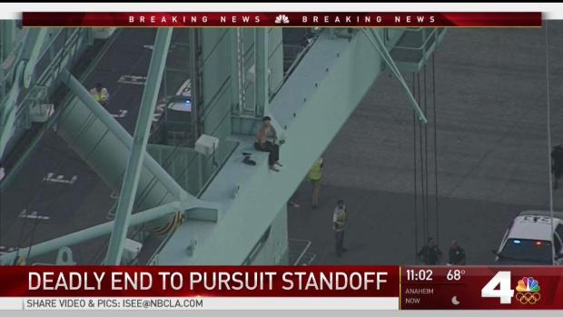 Man Atop Port of LA Crane Taunts Police After Chase Man Atop Port of LA Crane Taunts Police After Chase
