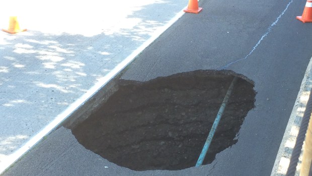 Sinkhole opens off I-8 near College Ave