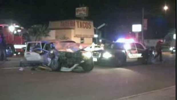 Police Cruiser Crashes into Car, Killing Two