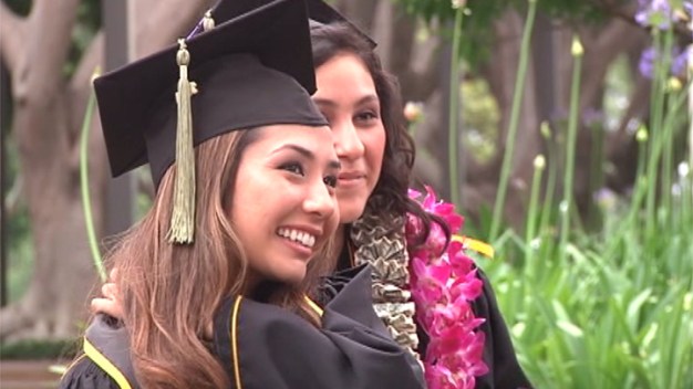 Young Woman, Born to Save Sister, Graduates College