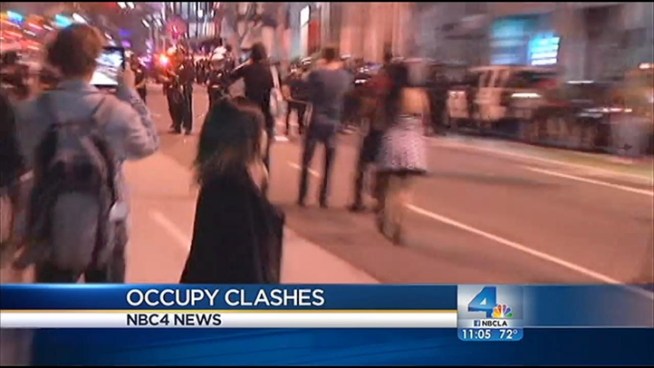 Occupy L.A. demonstrators are accusing police of triggering violence that led to 17 arrests in downtown Los Angeles. Four officers were injured Thursday night in confrontations that disrupted the monthly event known as Artwalk L.A. Beverly White reports for the NBC4 News at 11 p.m. on Friday, July 13, 2012.