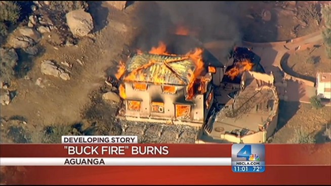 Two firefighters and a civilian were injured during a brush fire that continued to rage Tuesday night. The blaze broke out at about 1:40 p.m. Tuesday and quickly grew to consume thousands of acres, prompting mandatory evacuations in the rural area. NBC4's John Cadiz Klemack reports from the fire command post.